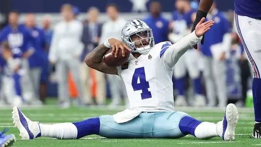 Sep 14, 2025; Arlington, Texas, USA; Dallas Cowboys quarterback Dak Prescott (4) reacts after a play against the New York Giants during overtime at AT&T Stadium. Mandatory Credit: Kevin Jairaj-Imagn Images