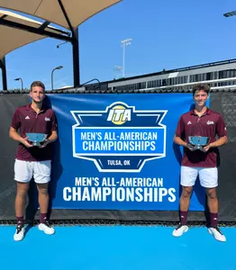 Petar Jovanovic and Benito Sanchez Martinez Pose with their ITA All-American Doubles Championship Trophy