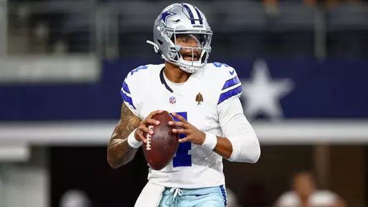 Aug 16, 2025; Arlington, Texas, USA; Dallas Cowboys quarterback Dak Prescott (4) warms up before the game against the Baltimore Ravens at AT&T Stadium. Mandatory Credit: Kevin Jairaj-Imagn Images