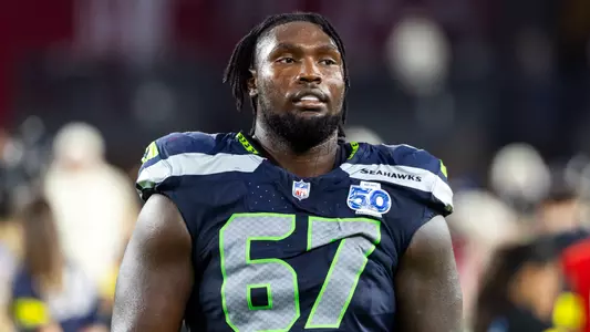 Sep 25, 2025; Glendale, Arizona, USA; Seattle Seahawks tackle Charles Cross (67) against the Arizona Cardinals at State Farm Stadium. Mandatory Credit: Mark J. Rebilas-Imagn Images