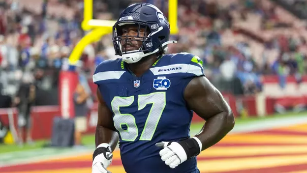 Sep 25, 2025; Glendale, Arizona, USA; Seattle Seahawks tackle Charles Cross (67) against the Arizona Cardinals at State Farm Stadium. Mandatory Credit: Mark J. Rebilas-Imagn Images
