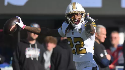 Oct 18, 2026; East Rutherford, New Jersey, USA; New Orleans Saints cornerback Martin Emerson Jr. (22) celebrates with defensive end Cameron Jordan (94) after intercepting a pass intended for New York Giants wide receiver Malik Nabers (not pictured) during the third quarter at MetLife Stadium. Mandatory Credit: John Jones-Imagn Images