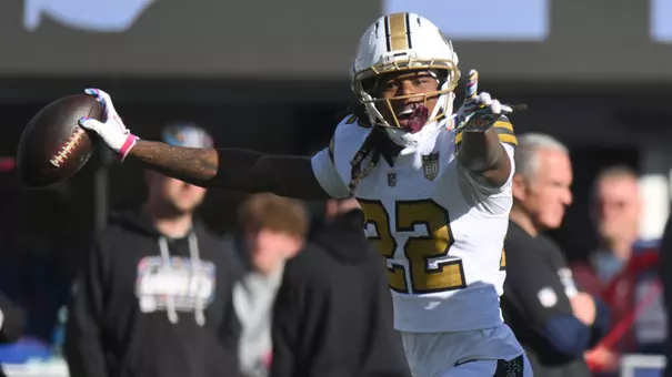 Oct 18, 2026; East Rutherford, New Jersey, USA; New Orleans Saints cornerback Martin Emerson Jr. (22) celebrates with defensive end Cameron Jordan (94) after intercepting a pass intended for New York Giants wide receiver Malik Nabers (not pictured) during the third quarter at MetLife Stadium. Mandatory Credit: John Jones-Imagn Images