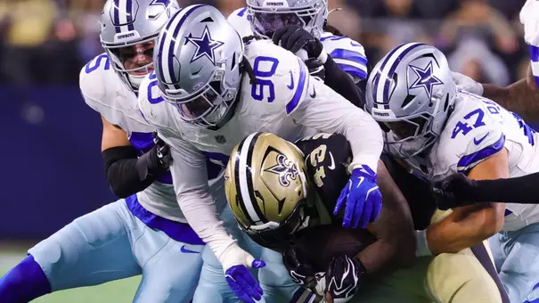 Aug 28, 2026; Arlington, Texas, USA; Dallas Cowboys linebacker Tyrus Wheat (90) tackles New Orleans Saints running back CJ Donaldson (43) during the game at AT&T Stadium. Mandatory Credit: Kevin Jairaj-Imagn Images