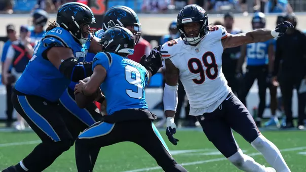Sep 13, 2026; Charlotte, North Carolina, USA; Chicago Bears defensive line Montez Sweat (98) pressures Carolina Panthers quarterback Bryce Young (9) in the second half at Bank of America Stadium. Mandatory Credit: Jim Dedmon-Imagn Images