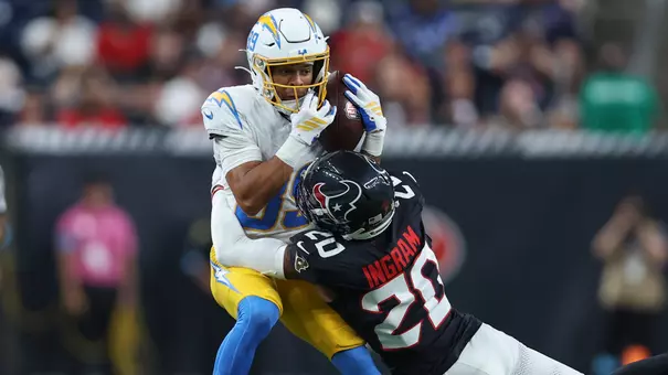 Aug 13, 2026; Houston, Texas, USA; Los Angeles Chargers wide receiver Brenen Thompson (89) makes a reception as Houston Texans cornerback Ja’Marcus Ingram (20) defends during the second quarter at Reliant Stadium. Mandatory Credit: Troy Taormina-Imagn Images