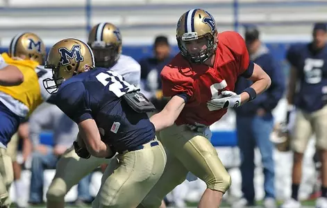 Cody Kirk takes handoff