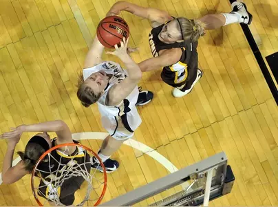 WBB_SEMANSKY_OVER_HEAD_REB_WYO_2012.