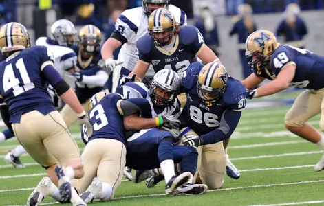 Minter and Owens on tackle