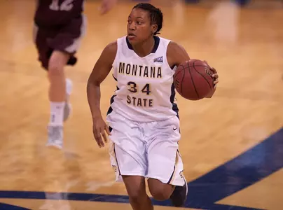 WBB_ADAMS_DRIBBLE_GRIZ_2013