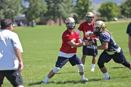 Dakota Prukop hands off