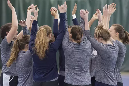 WTN_17_TEAM_HUDDLE_HANDS_UP