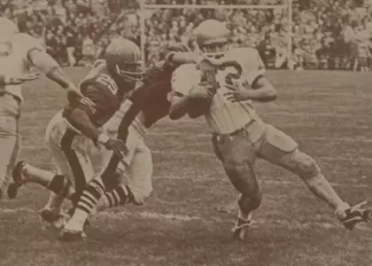 Paul Schafer tackled at UM in 1968