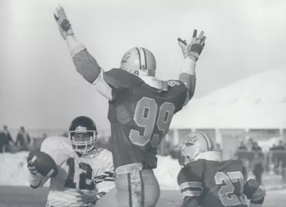 Greg Wilks (99) and Clete Linebarger (27) vs Arkansas State