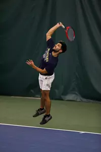 Espinoza serves