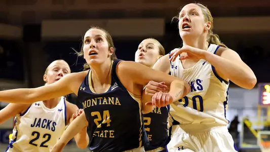 BROOKINGS, SD - January 6: Taylor Janssen #24 of the Montana State Bobcats battle for position with Tori Nelson #20 of the South Dakota State Jackrabbits at Frost Arena on January 6, 2024 in Brookings, South Dakota. (Photo Dave Eggen/Inertia)