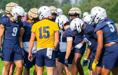 Patrick Duchien in huddle