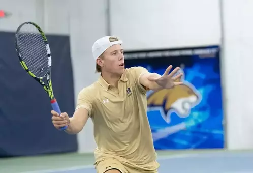 Eddie Biss forehand at net