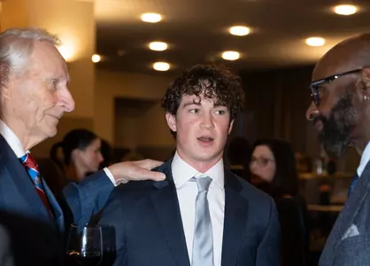 Tommy Mellott with Jan Stenerud (left) and Jerry Rice (right)