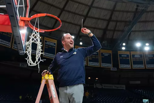 Leon Costello cuts the net