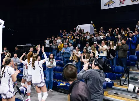 Bobcats celebrate with students (Jordan Fetterman)