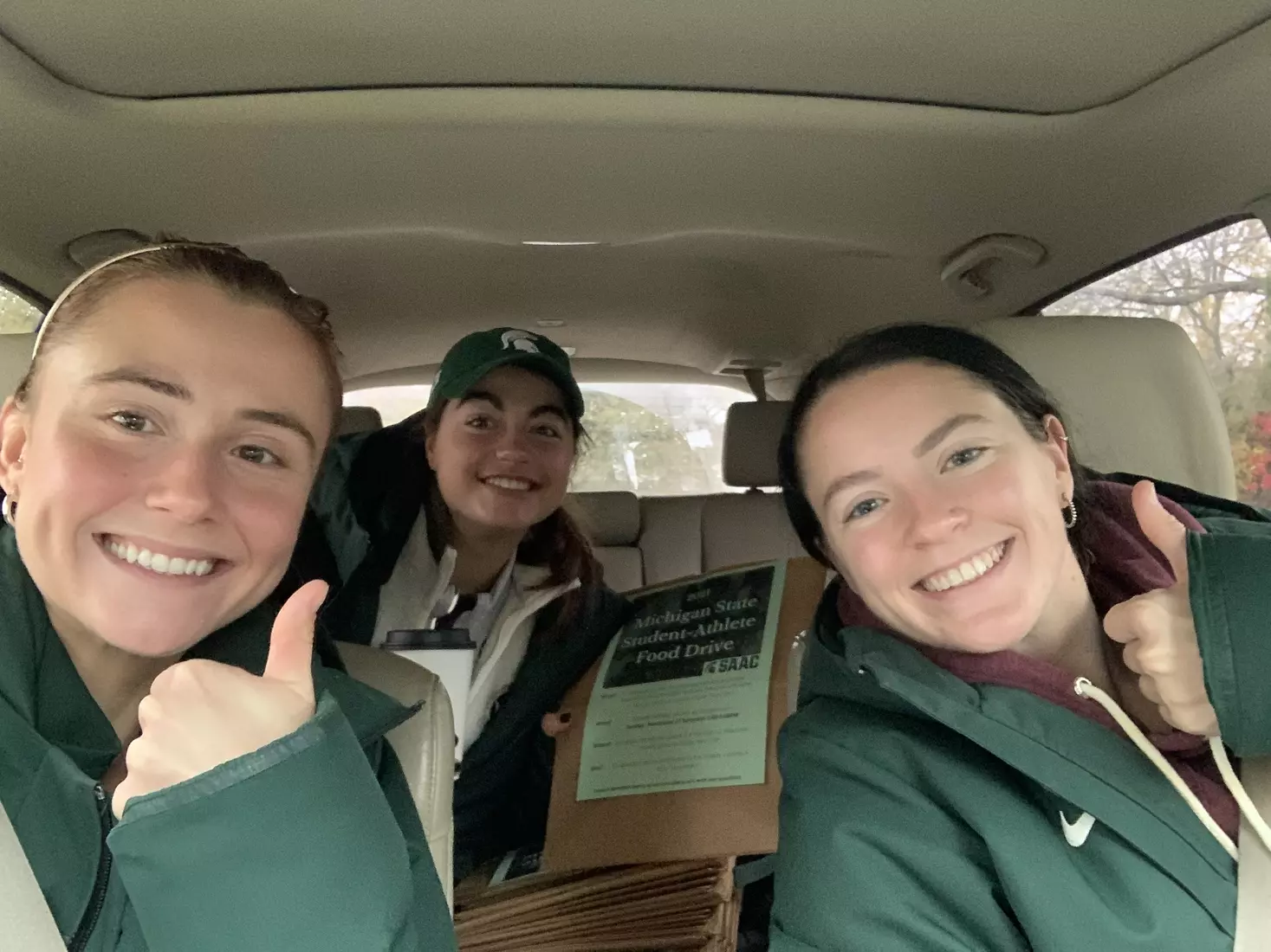 MSU's Student-Athlete Field Drive had volunteers from 12 of MSU's varsity sports and gathered more than 5,000 lbs of food for the Greater Lansing Food Bank.