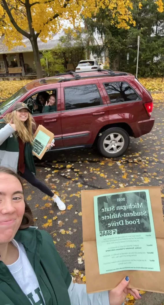 MSU's Student-Athlete Field Drive had volunteers from 12 of MSU's varsity sports and gathered more than 5,000 lbs of food for the Greater Lansing Food Bank.