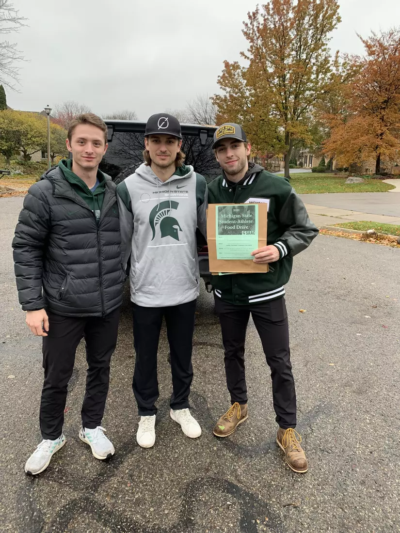 MSU's Student-Athlete Field Drive had volunteers from 12 of MSU's varsity sports and gathered more than 5,000 lbs of food for the Greater Lansing Food Bank.