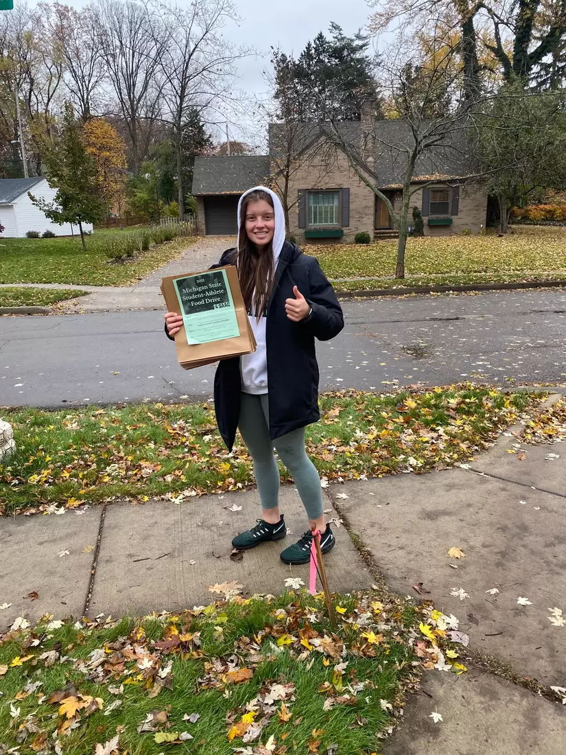 MSU's Student-Athlete Field Drive had volunteers from 12 of MSU's varsity sports and gathered more than 5,000 lbs of food for the Greater Lansing Food Bank.