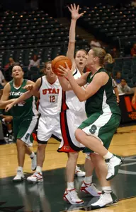 Liz Shimek goes up for a shot against Utah's Kim Smith during the second half.