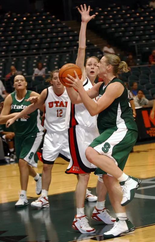 Liz Shimek goes up for a shot against Utah's Kim Smith during the second half.