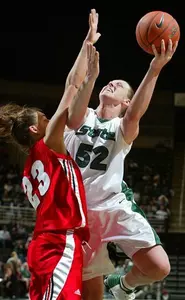 Liz Shimek shoots against Wisconsin's Jordan Wilson in the first half.