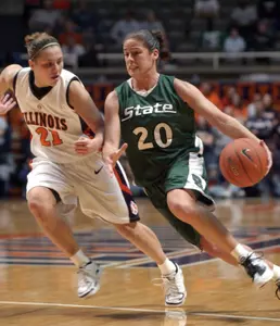 Lindsay Bowen pushes the ball up the floor against Illinois' Maggie Acuna in the first half.