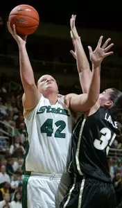 Kelli Roehrig shoots against Purdue's Erin Lawless in the first half. (AP Photo/Al Goldis)