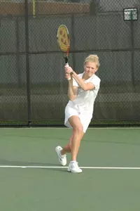 Senior Karen Gustafson is one of three Spartans to achieve perfect singles matches.