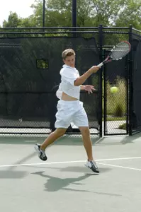 Freshman Adam Monich earned a win at doubles and singles Sunday at Washington.