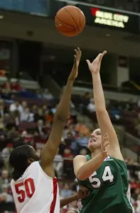 Laura Hall takes a shot over Ohio State's Jessica Davenport during the first half.