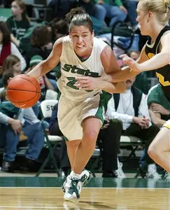 Lindsay Bowen drives against Iowa's Jenna Armstrong in the second half of MSU's 68-56 win. (AP Photo/Al Goldis)