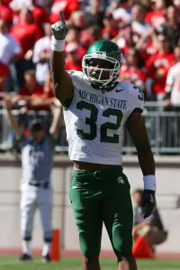 Michigan State wide receiver Jerramy Scott (32) celebrates his touchdown in the end zone in the second quarter against Ohio State Saturday, Oct. 15, 2005 at the Ohio Stadium in Columbus, Ohio.