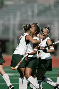 Huynh-Ba (middle) is congratulated after scoring one of her team-leading 10 goals.