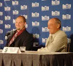 Chris Morris, one of the top centers in the nation, sits next to Coach John L. Smith at this year's Big Ten Media Day in Chicago.