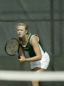 Sophomore Christine Bader awaits a serve