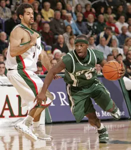 Travis Walton drives past Wisconsin-Green Bay during the first half on Wednesday. (AP Photo)