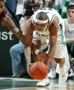Maurice Ager picks up a loose ball on a steal against Minnesota's Vincent Grier in the first half.