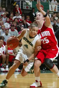 Kristin Haynie drives against Ohio State's Caity Matter.