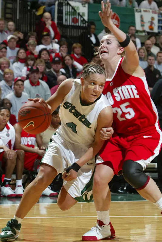 Kristin Haynie drives against Ohio State's Caity Matter.