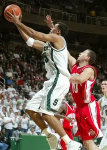 Chris Hill puts up a driving shot against Ohio State's Tony Stockman in the first half.