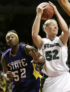 Liz Shimek pulls down a rebound over Alcorn State center Candace Roberts.