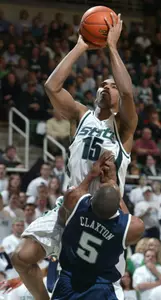 Alan Anderson shoots over Penn State's Geary Claxton.