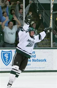 Colton Fretter celebrates his first-period tally against Michigan